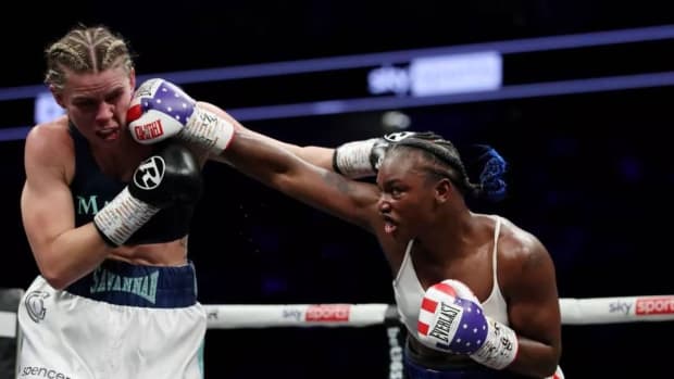Claressa Shields (R) punches Savannah Marshall (L) during the IBF, WBA, WBC, WBO World Middleweight Title fight, which is the first women's only boxing card in the UK at The O2 Arena on in London, England. Claressa Shields looks to rematch Savannah Marshall in MMA match. JAMES CHANCE/GETTY IMAGES. 